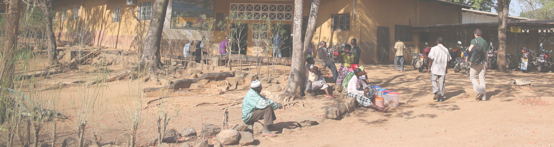 Rural scene in africa with people sat down